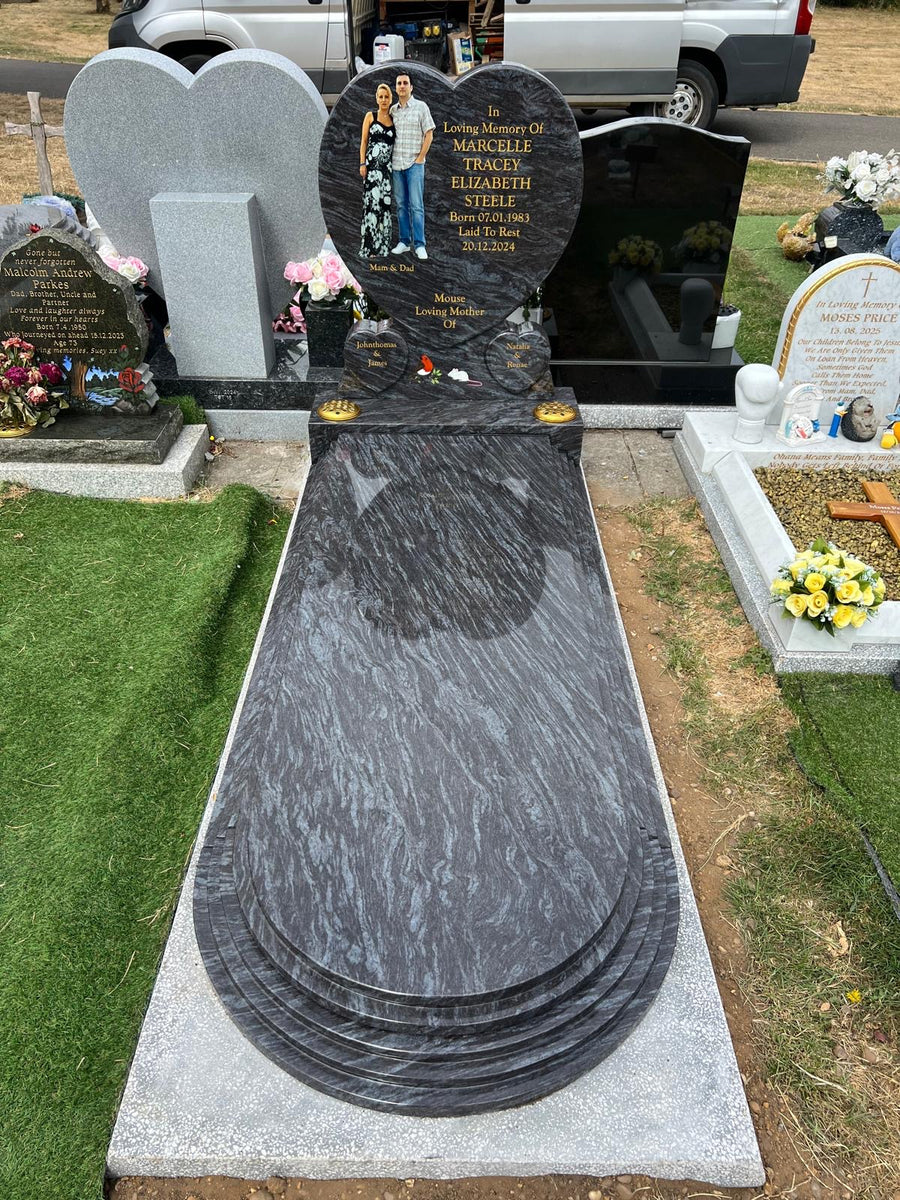 Completed heart shaped memorial with portrait and granite kerb set