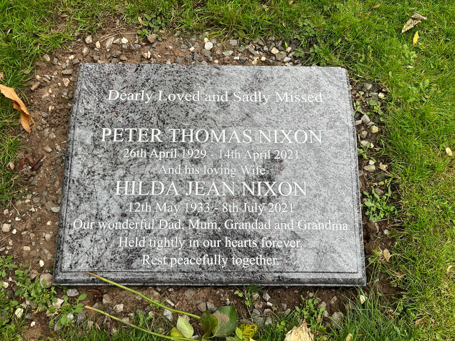Traditional grey granite flat memorial tablet with engraved inscription
